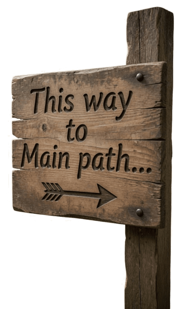 Rustic wooden signpost carved with 'This way to Main path' and a directional arrow